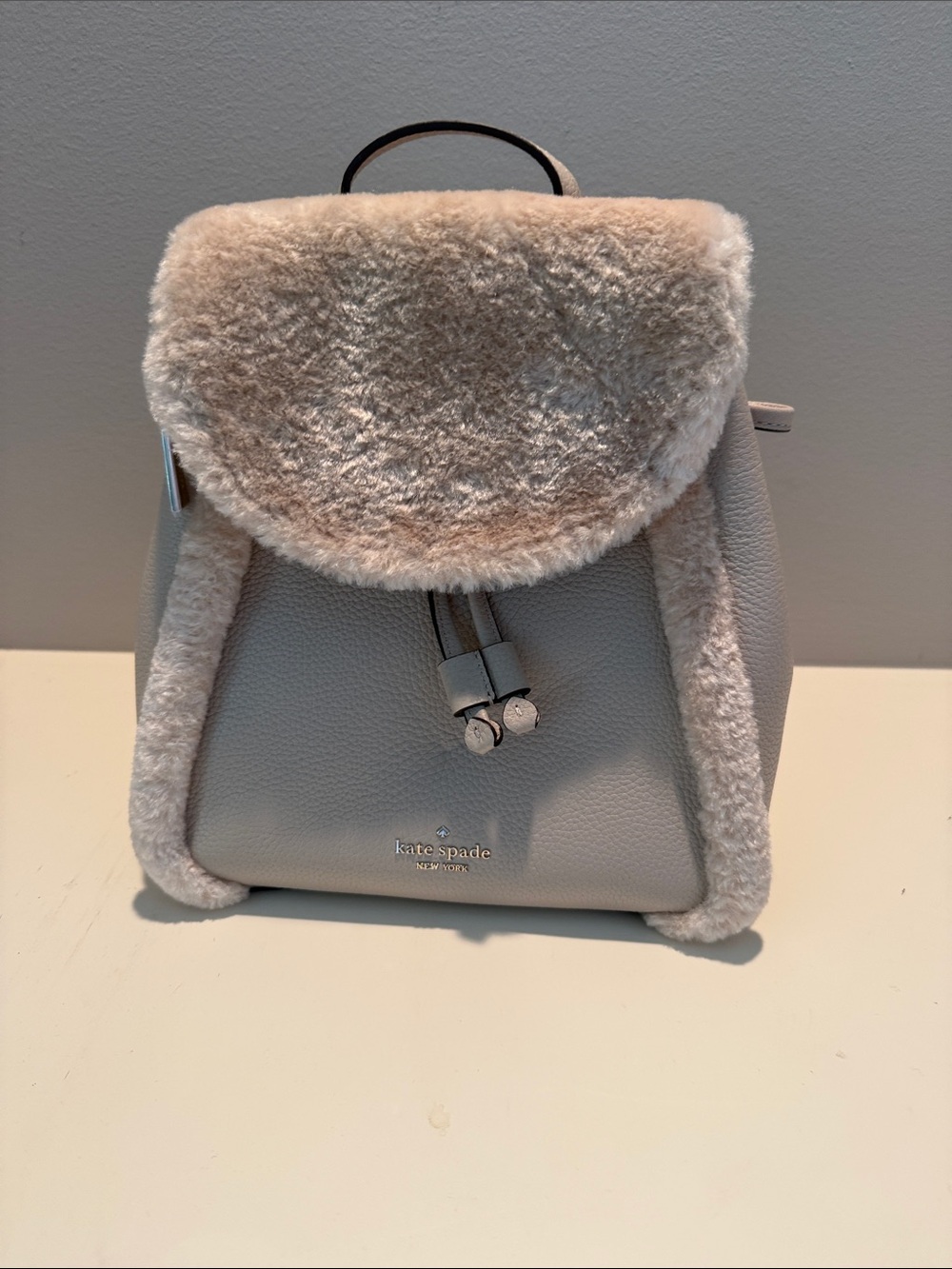 kate spade light gray shearling-trim leather backpack